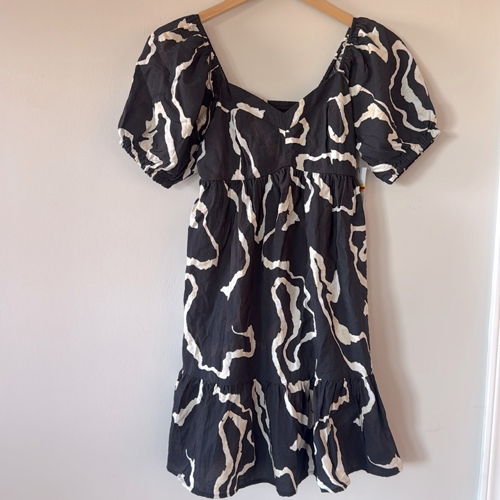 NWT! Nine West baby doll black ruffle hem mini dress. Size small.